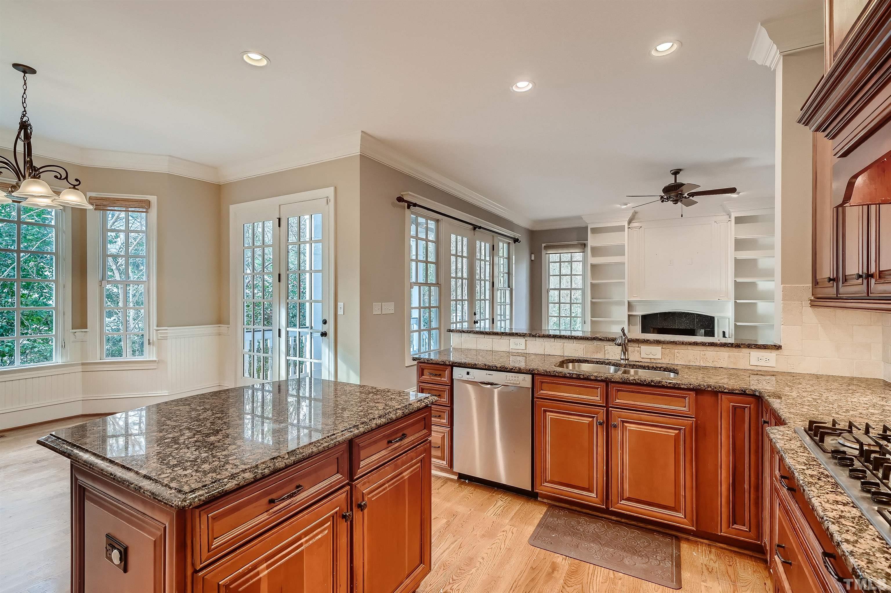 2714 Rosedale Avenue Raleigh, NC 27607 - Photo 9 of 28 a kitchen with sink stove and cabinets