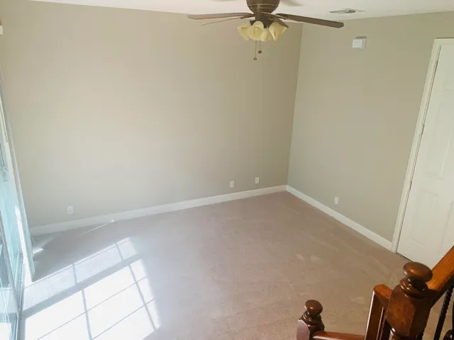 a view of a room with rack on the wall