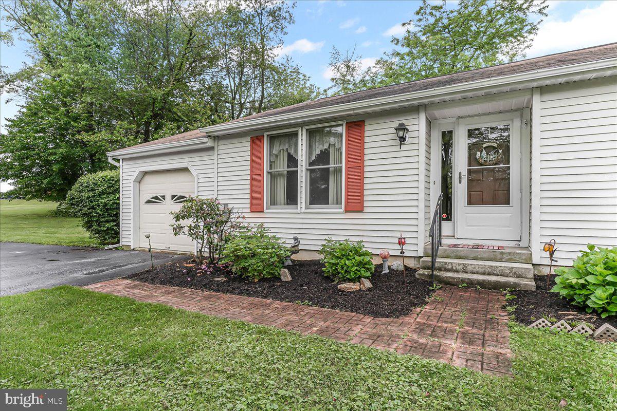 252 Althouse Road Cochranville, PA 19330 - Photo 2 of 28 a front view of a house with garden