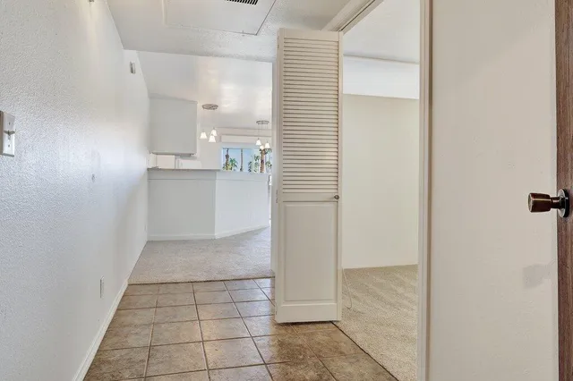 a view of a kitchen with a sink