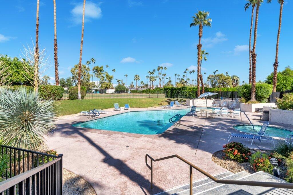 5300 East Waverly Drive, Unit 4209 Palm Springs, CA 92264 - Photo 13 of 13 a view of a lake with a palm yard