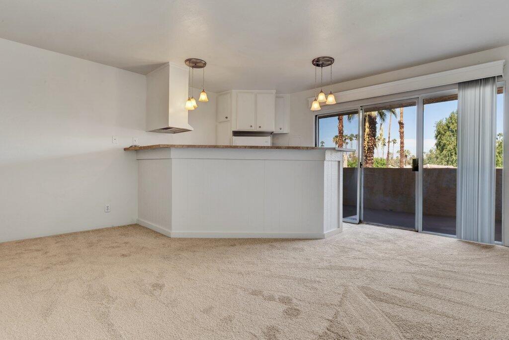 5300 East Waverly Drive, Unit 4209 Palm Springs, CA 92264 - Photo 3 of 13 a view of a kitchen with a sink