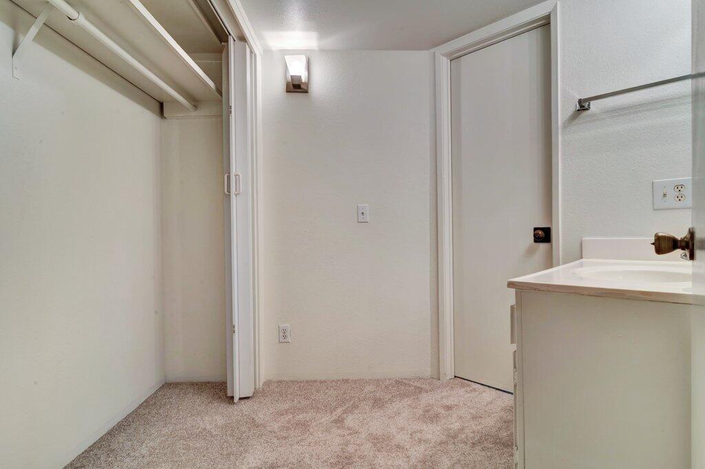 5300 East Waverly Drive, Unit 4209 Palm Springs, CA 92264 - Photo 8 of 13 a view of a sink and a mirror
