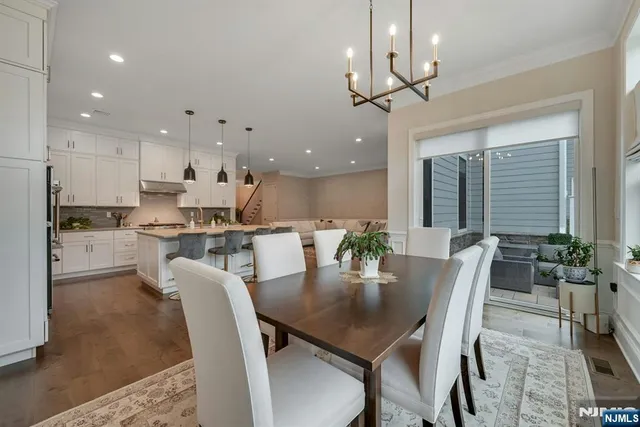 a bedroom with a bed and a potted plant