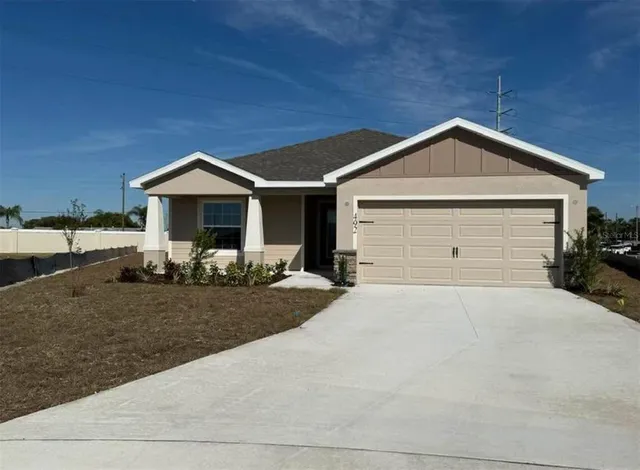 a front view of a house with yard