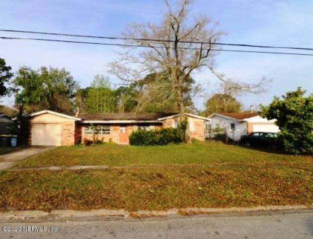4104 Dayrl Road Jacksonville, FL 32207 - Photo 1 of 8 a front view of a house with a yard and garage