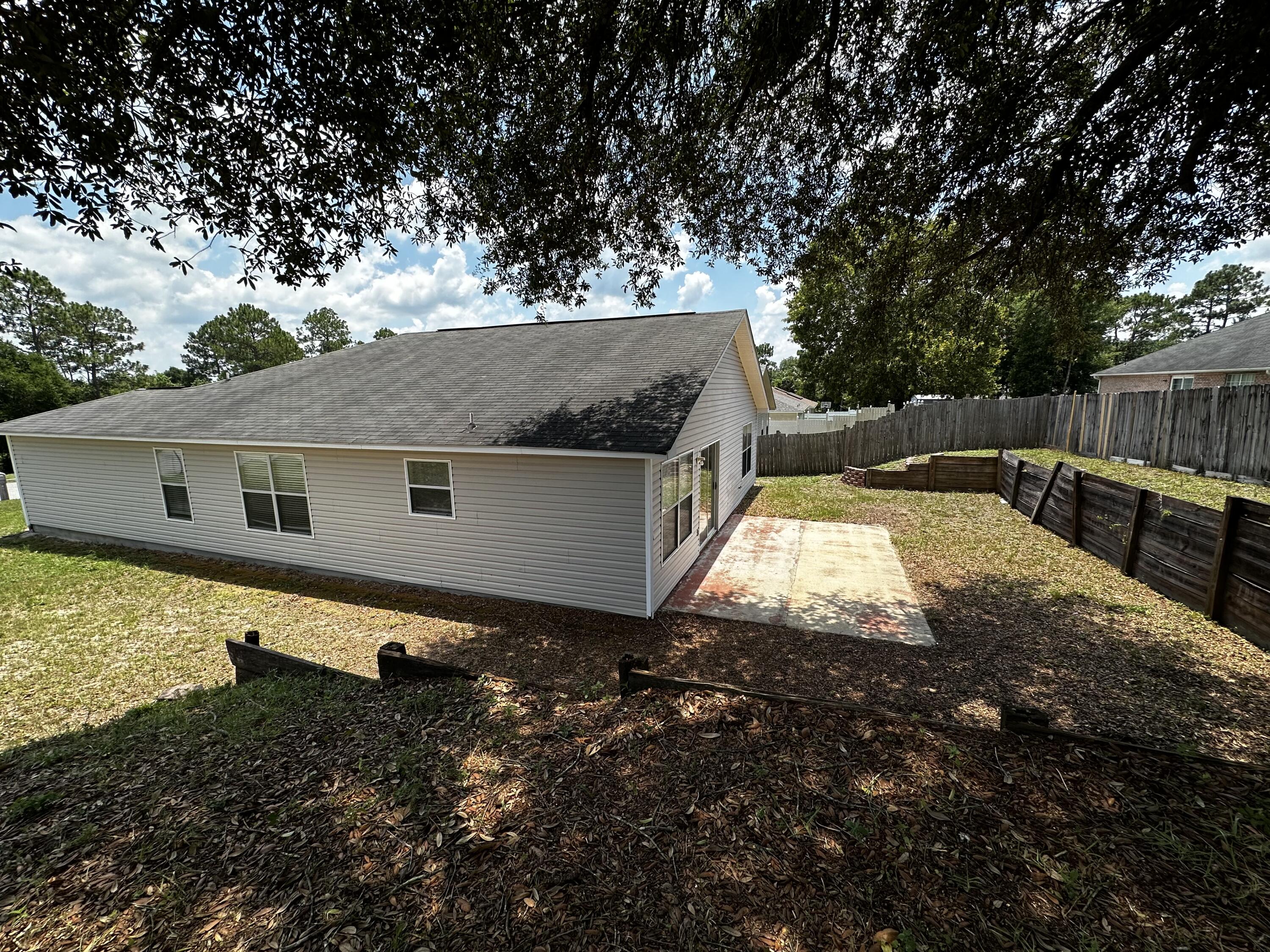 136 Sandstone Trail Crestview, FL 32539 - Photo 3 of 17 an aerial view of a house with yard