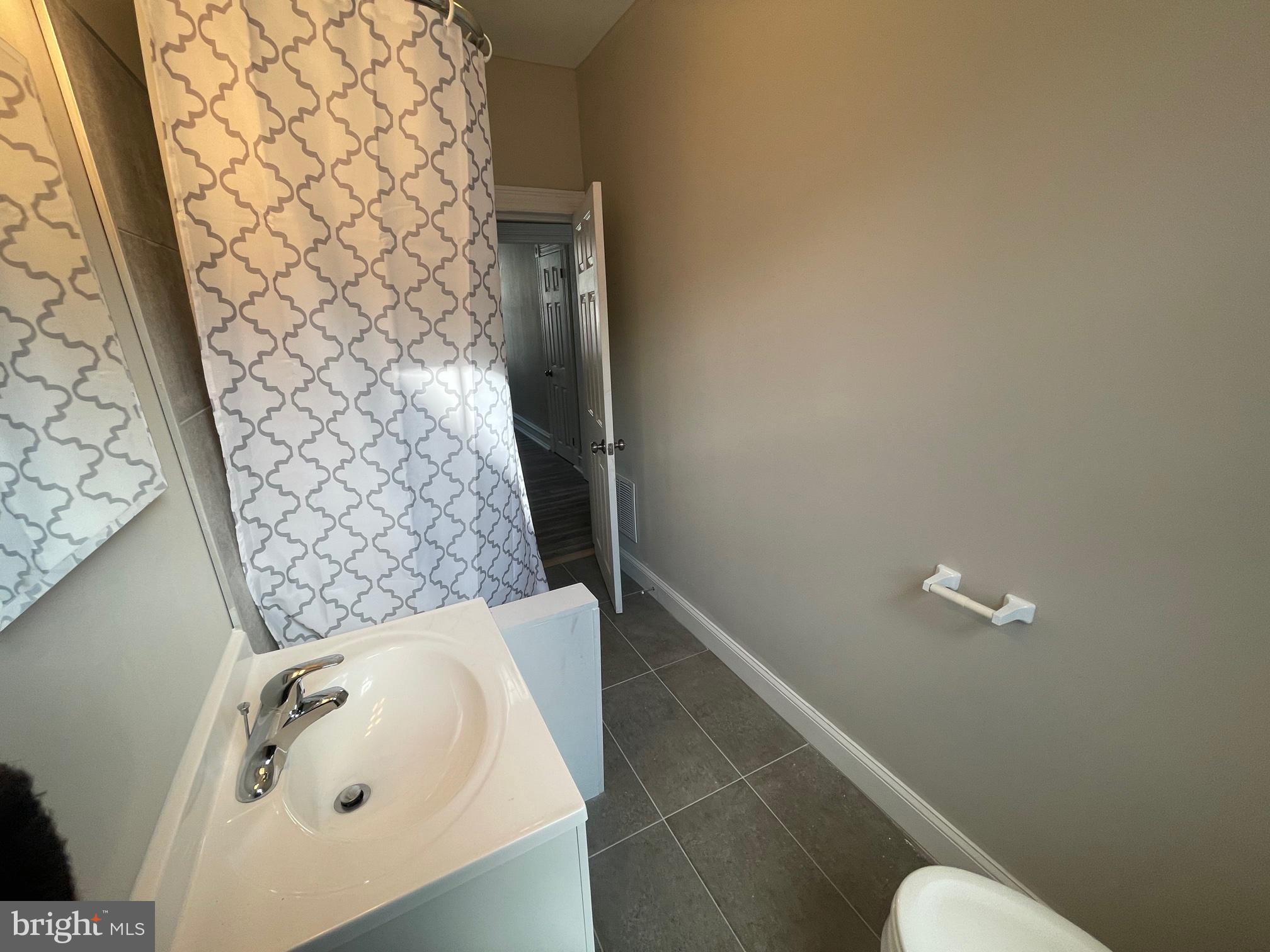 10 Clifton Avenue, Unit B Merchantville, NJ 08109 - Photo 15 of 20 a bathroom with a bathtub and shower