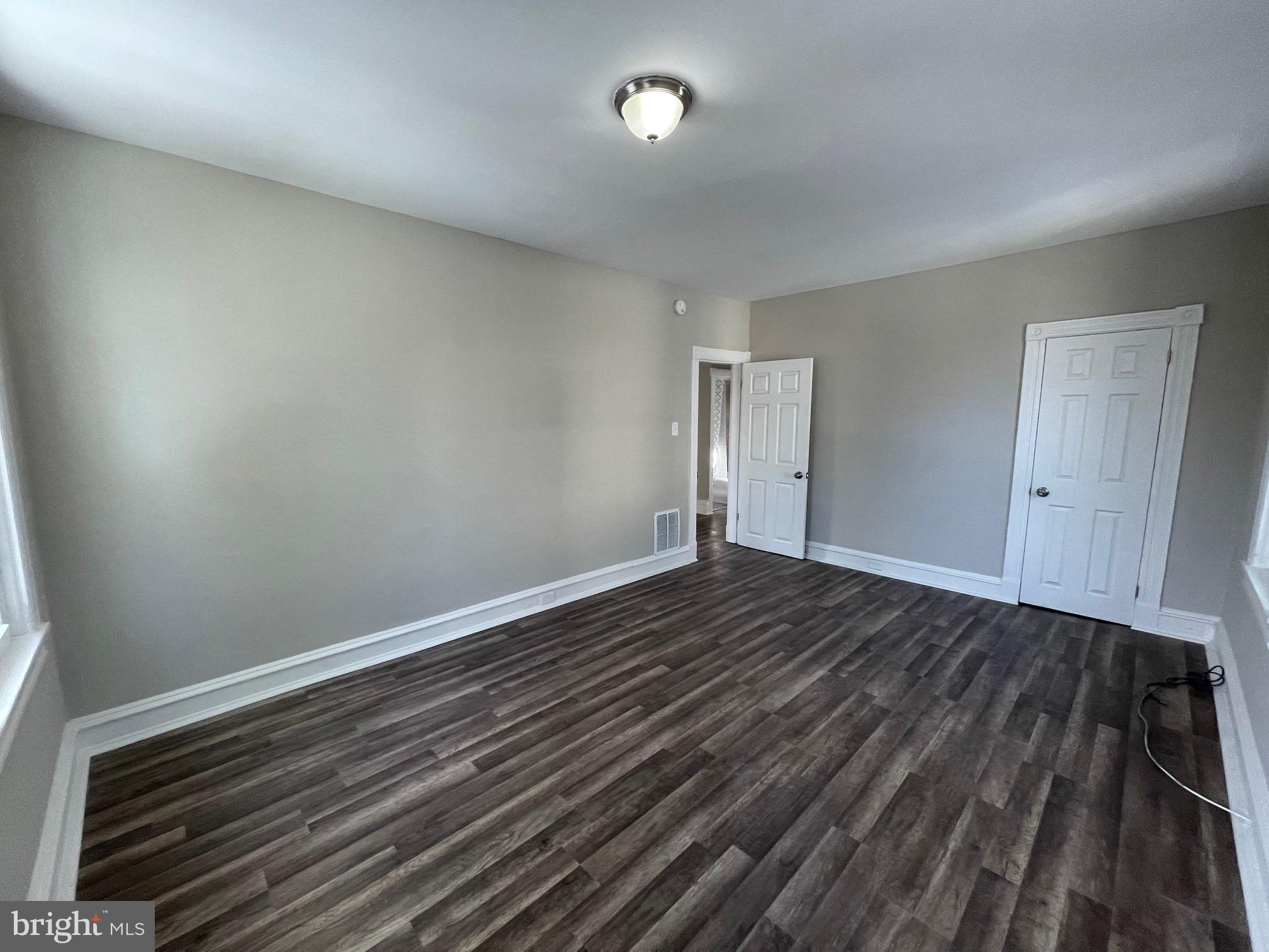 10 Clifton Avenue, Unit B Merchantville, NJ 08109 - Photo 10 of 20 a view of room with wooden floor