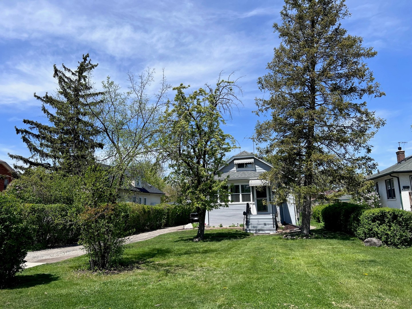 184 Waubansee Road Riverside, IL 60546 - Photo 2 of 38 a view of a house with a yard porch and sitting area