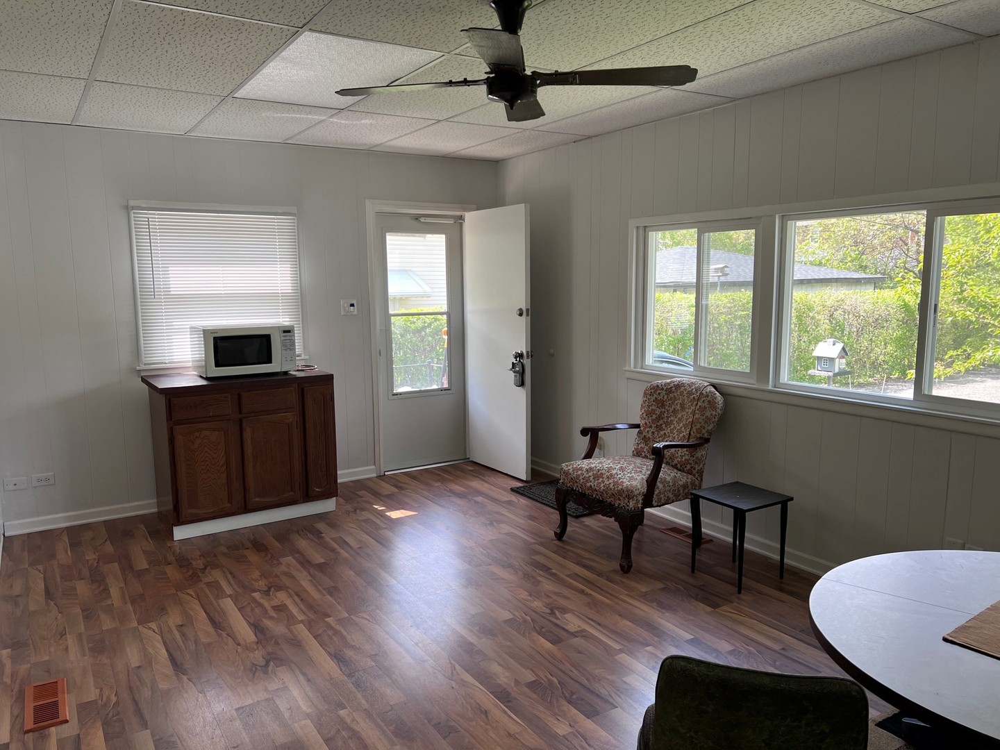 184 Waubansee Road Riverside, IL 60546 - Photo 30 of 38 a view of a workspace with furniture and a window