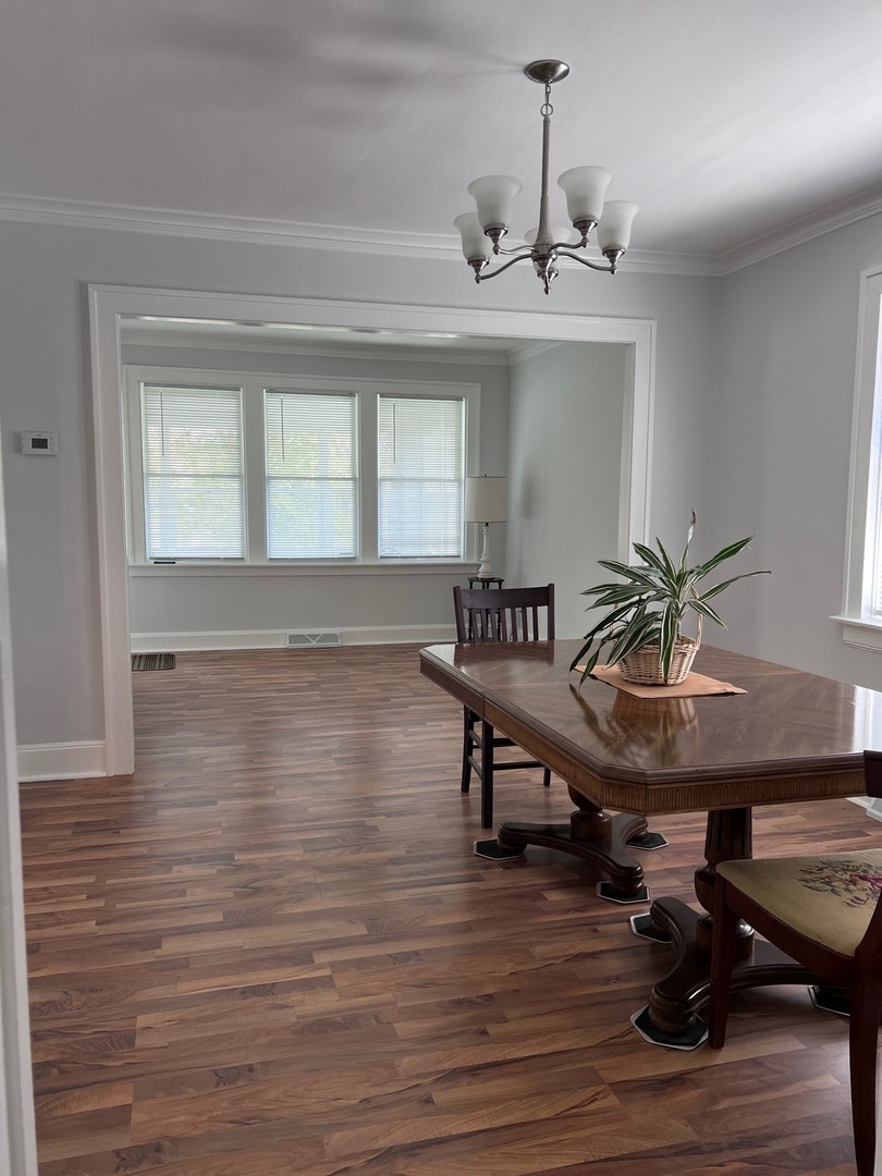 184 Waubansee Road Riverside, IL 60546 - Photo 36 of 38 a view of a room with furniture and wooden floor