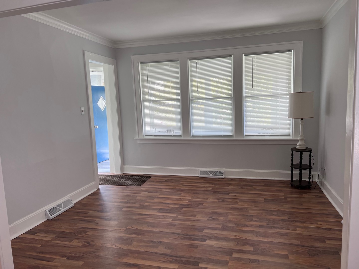 184 Waubansee Road Riverside, IL 60546 - Photo 37 of 38 wooden floor in an empty room with a window