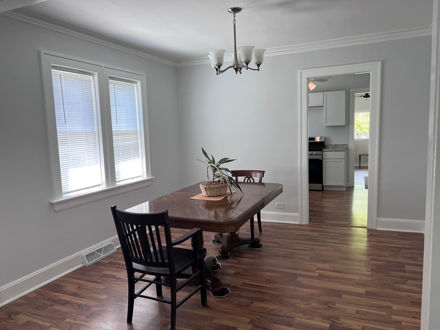 184 Waubansee Road Riverside, IL 60546 - Photo 8 of 38 a view of a dining room with furniture and wooden floor