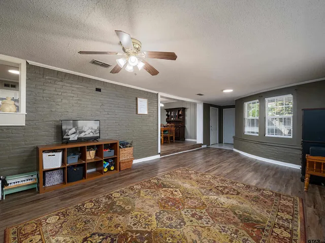 a view of livingroom with window and furniture
