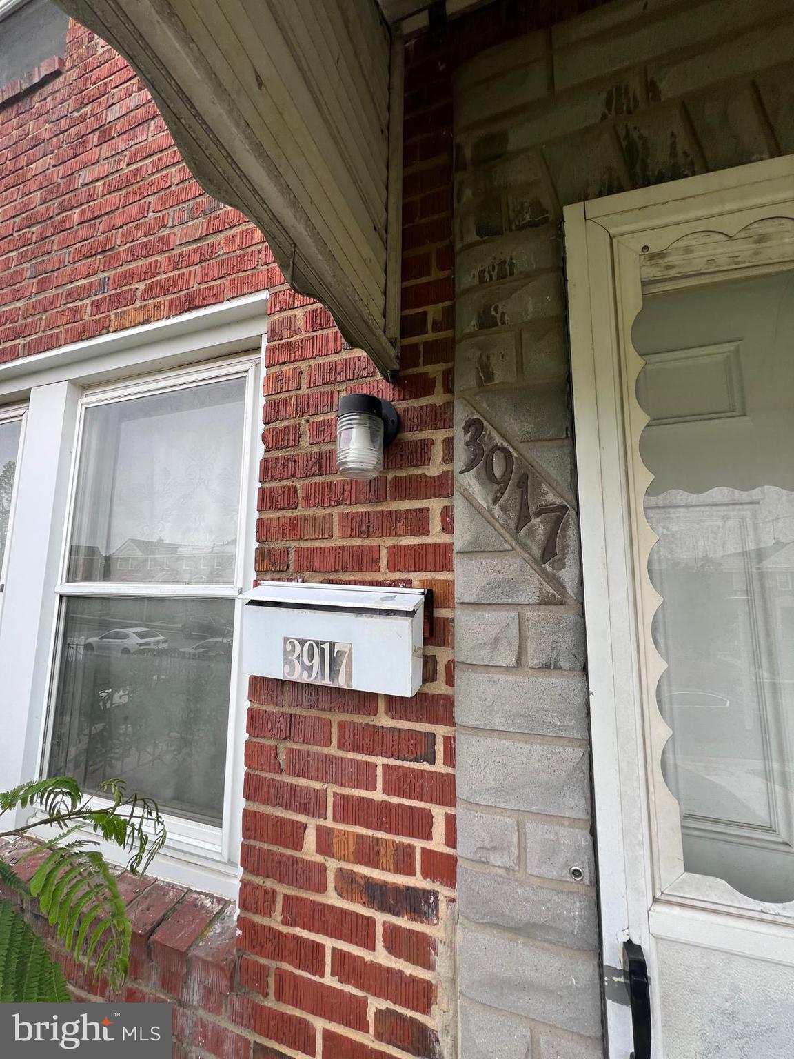 3917 Dudley Avenue Baltimore, MD 21213 - Photo 12 of 65 a view of front door of house