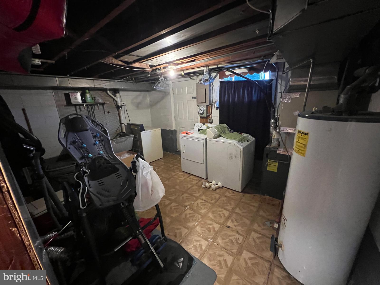 3917 Dudley Avenue Baltimore, MD 21213 - Photo 32 of 65 a utility room with dryer and washer