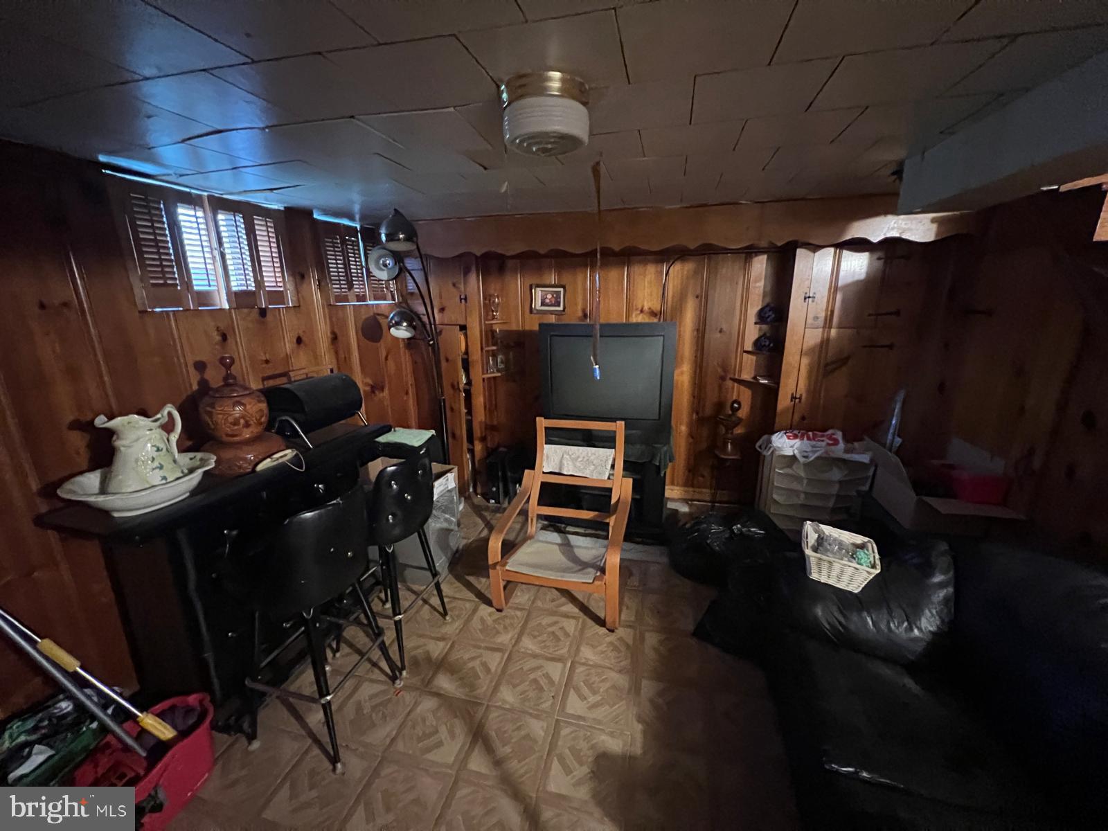 3917 Dudley Avenue Baltimore, MD 21213 - Photo 36 of 65 a very nice looking room with many windows