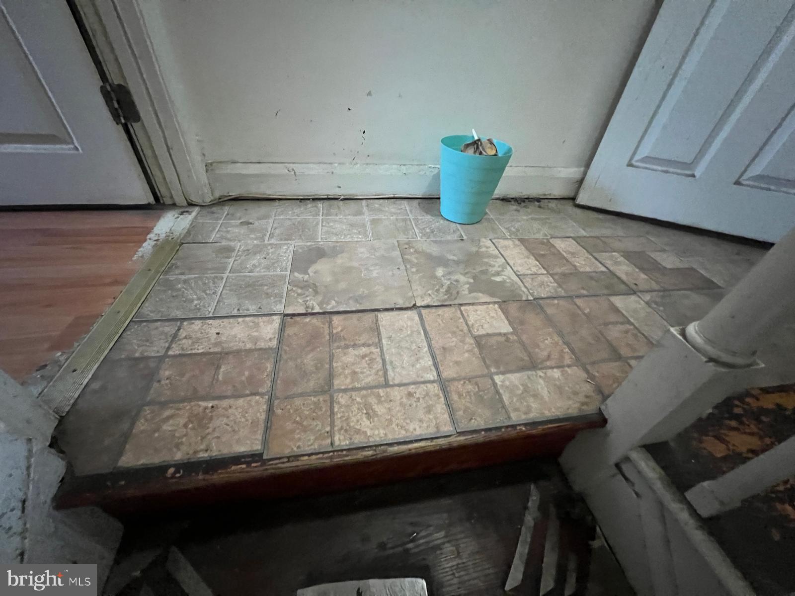 3917 Dudley Avenue Baltimore, MD 21213 - Photo 52 of 65 a view of a room with wooden floor and chair