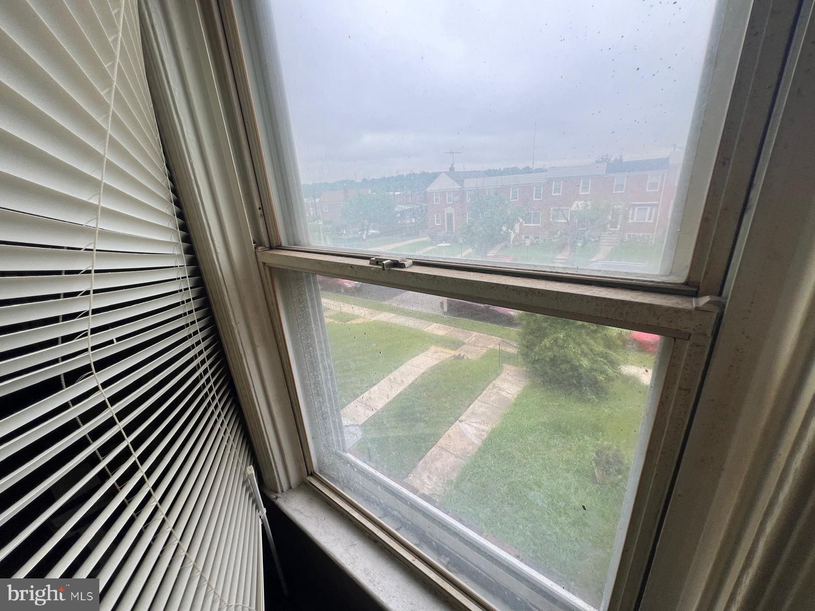 3917 Dudley Avenue Baltimore, MD 21213 - Photo 54 of 65 a view of a balcony with wooden floor