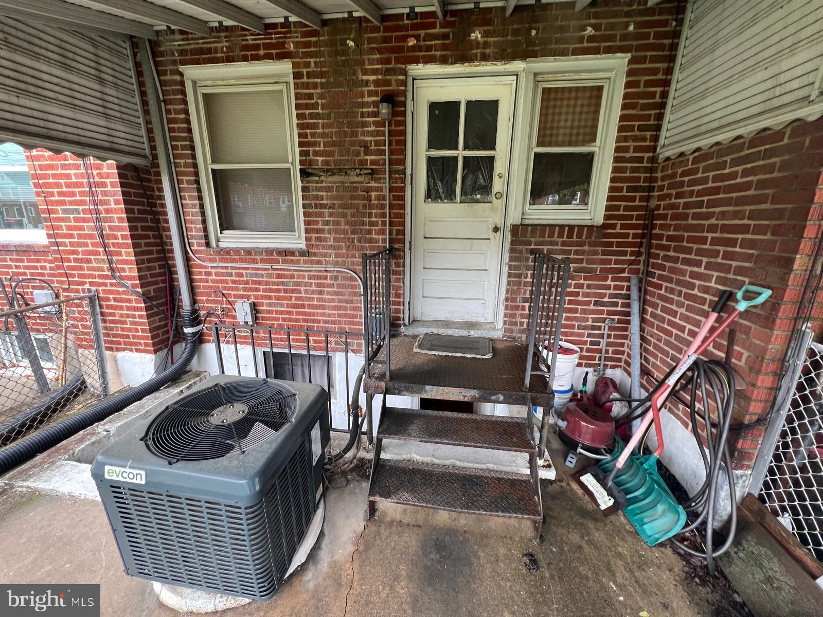 3917 Dudley Avenue Baltimore, MD 21213 - Photo 57 of 65 a view of a house with a door and wooden floor