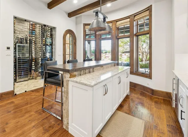 a view of living room with granite countertop furniture and a fireplace