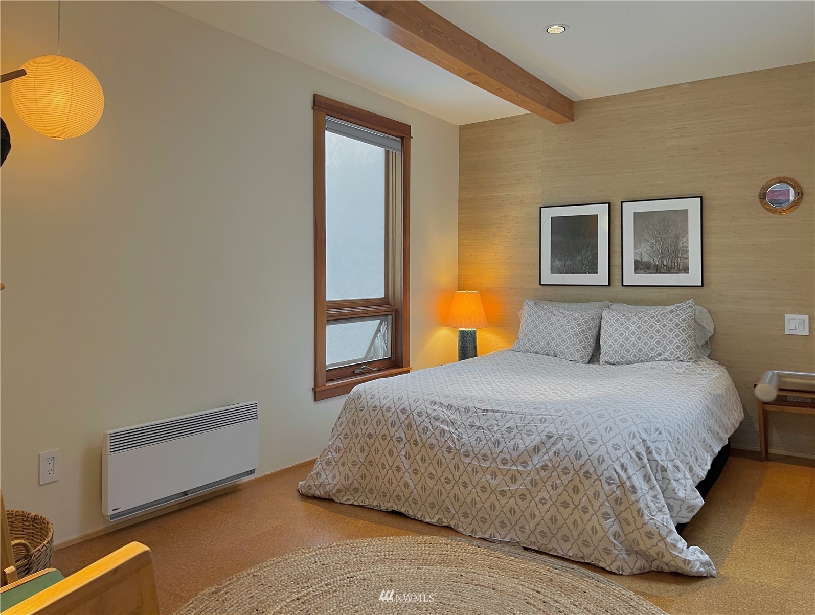 2019 Fairview Avenue East, Unit R Seattle, WA 98102 - Photo 13 of 23 a bedroom with a bed and a window