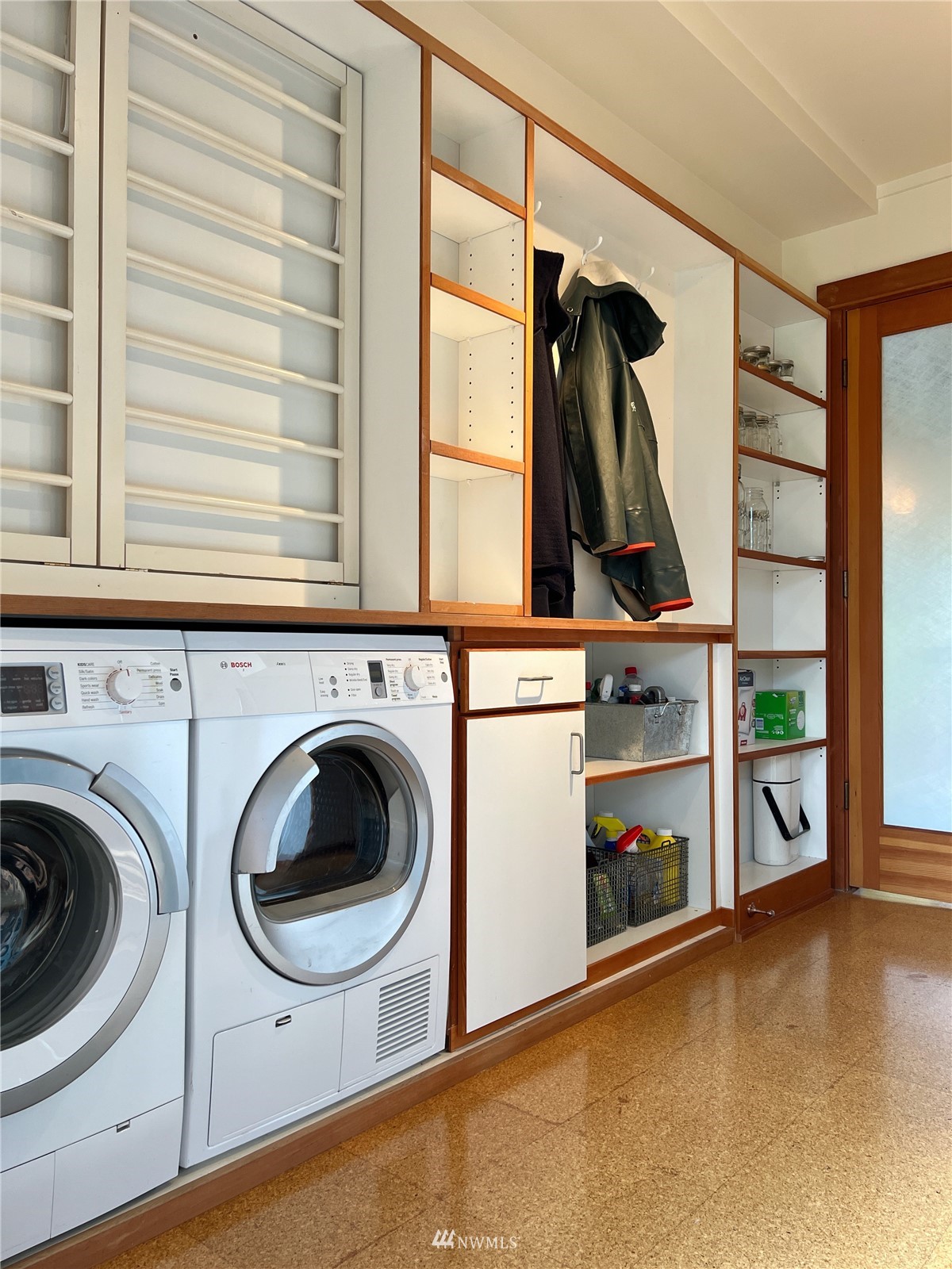 2019 Fairview Avenue East, Unit R Seattle, WA 98102 - Photo 16 of 23 a view of walk in closet with clothes and shoes