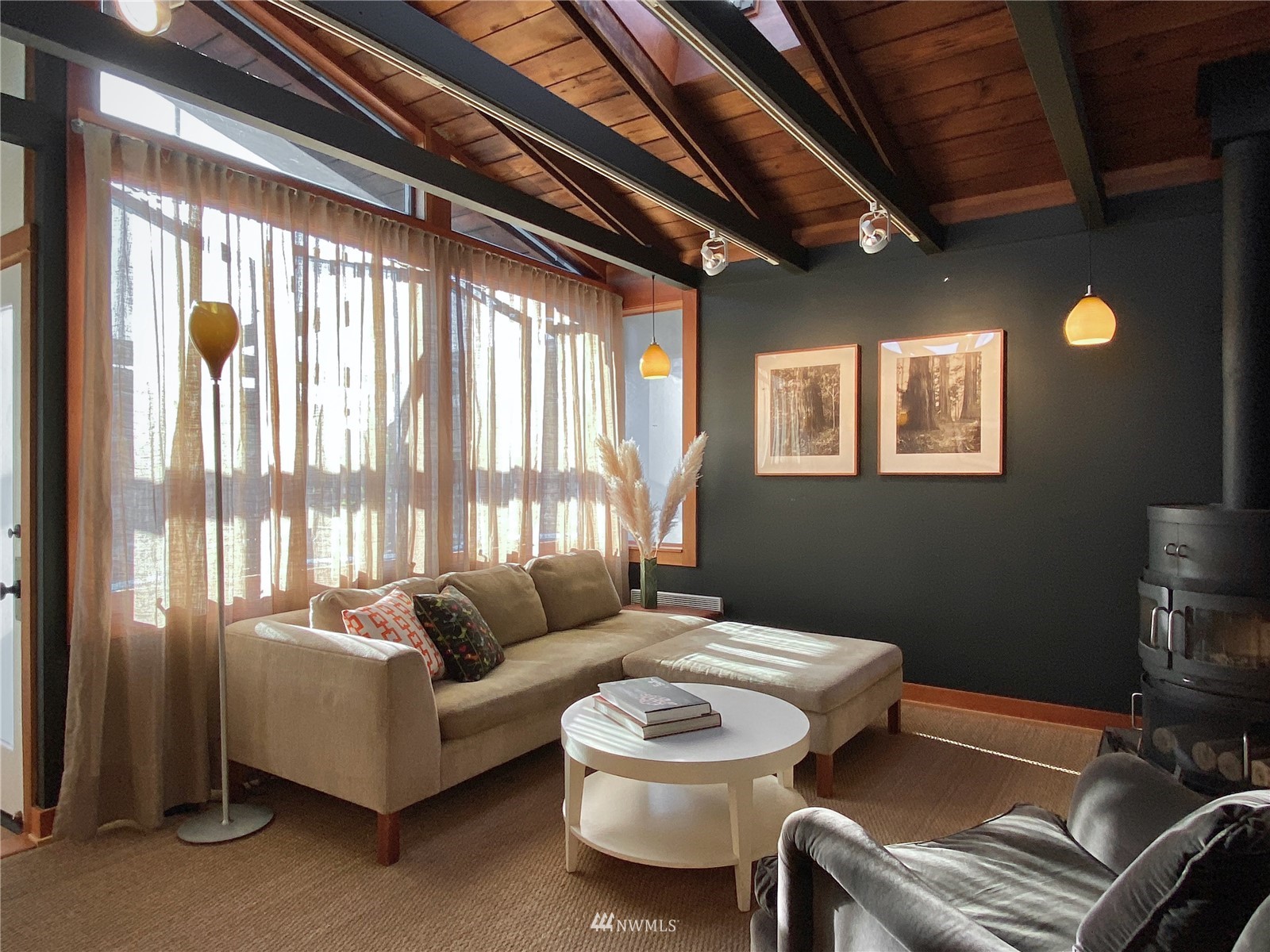 2019 Fairview Avenue East, Unit R Seattle, WA 98102 - Photo 3 of 23 a living room with furniture and a window