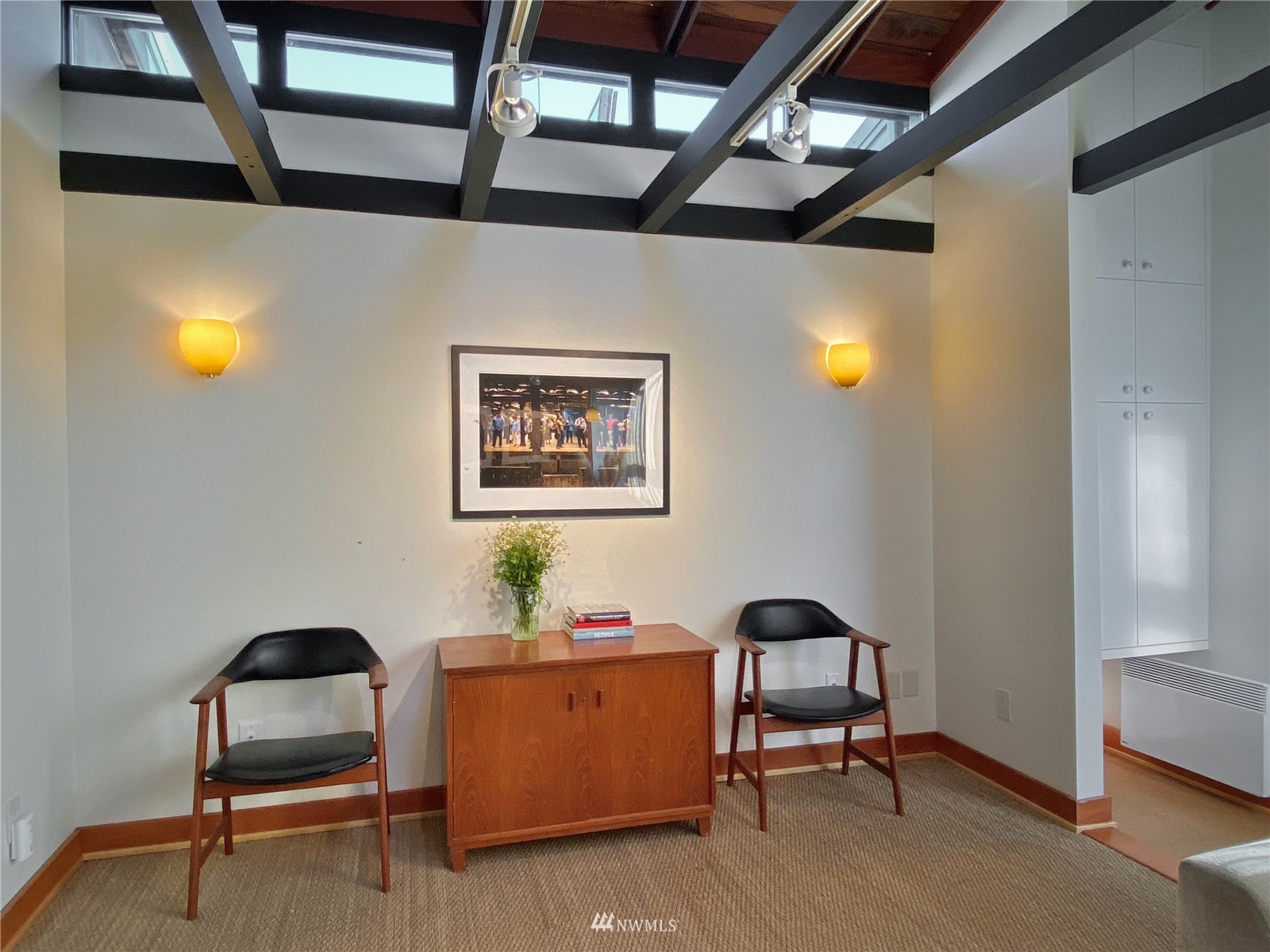 2019 Fairview Avenue East, Unit R Seattle, WA 98102 - Photo 4 of 23 a workspace with furniture and window