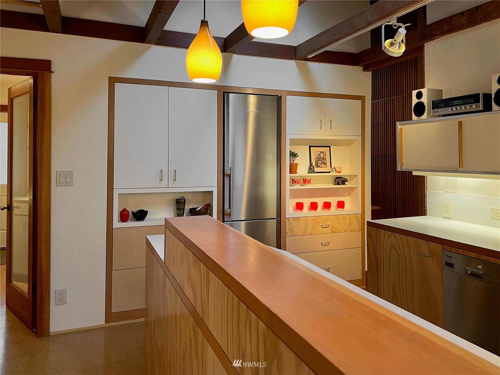 2019 Fairview Avenue East, Unit R Seattle, WA 98102 - Photo 8 of 23 a kitchen with a refrigerator and a sink