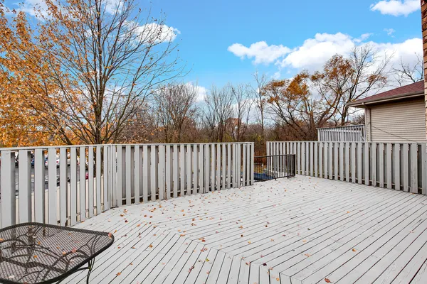 a view of a wooden fence