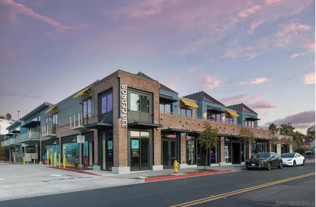 a view of a building with a street
