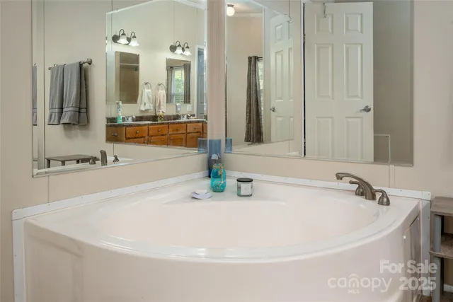 a bathroom with a bathtub and a sink