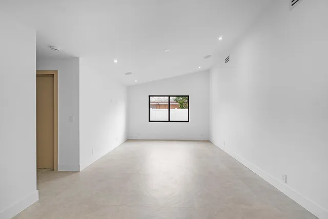 a small space with a white wall