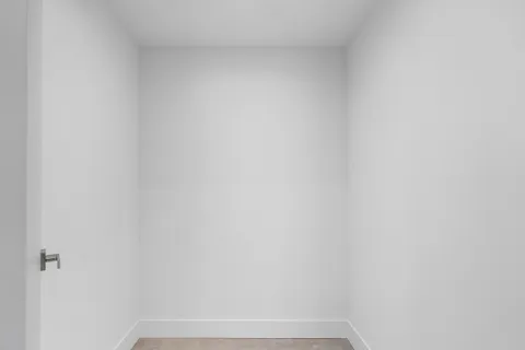 a kitchen with a white cabinets and sink
