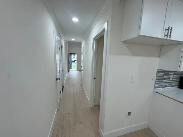a view of hallway with stairs