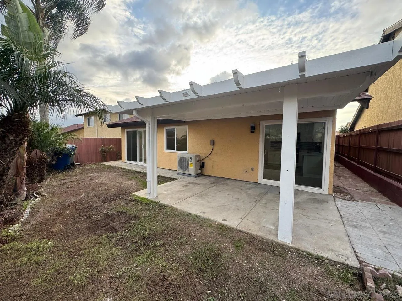 1205 27th Street San Diego, CA 92154 - Photo 21 of 25 a view of a house with a patio