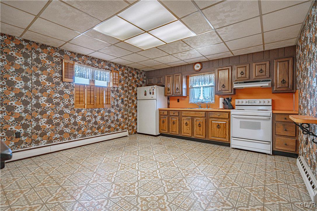 111 Maple Street Coplay, PA 18037 - Photo 11 of 38 a view of a kitchen with storage and utility
