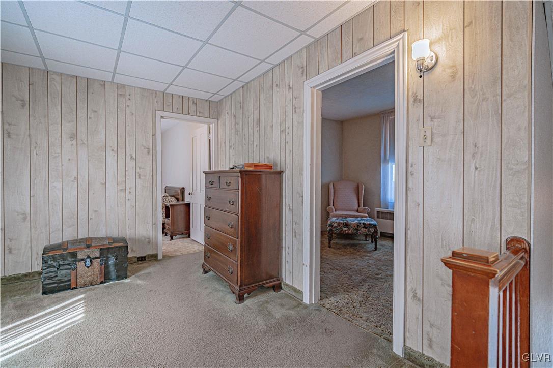 111 Maple Street Coplay, PA 18037 - Photo 16 of 38 a view of a hallway with closet and a couch