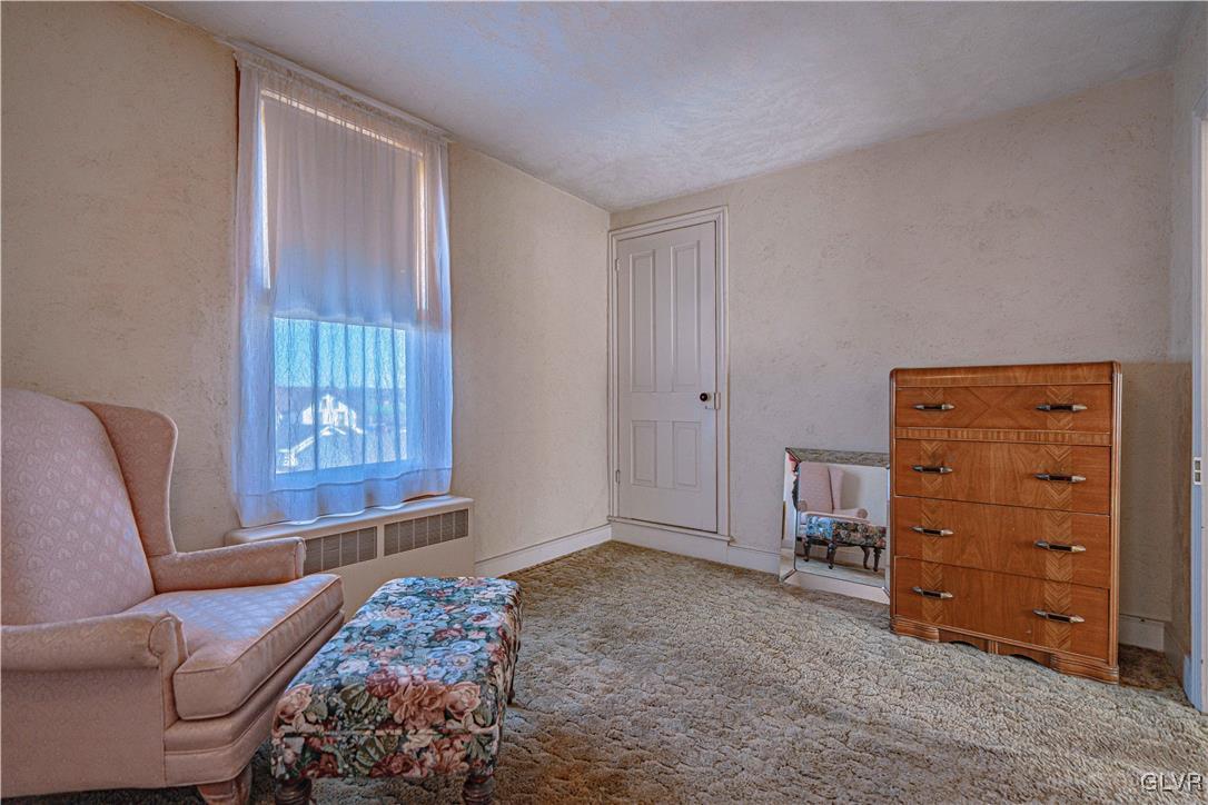 111 Maple Street Coplay, PA 18037 - Photo 19 of 38 a bedroom with a bed and a window