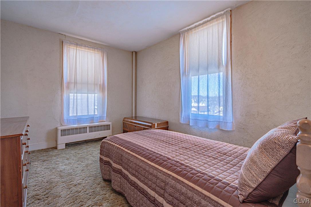111 Maple Street Coplay, PA 18037 - Photo 20 of 38 a bedroom with a bed and a window