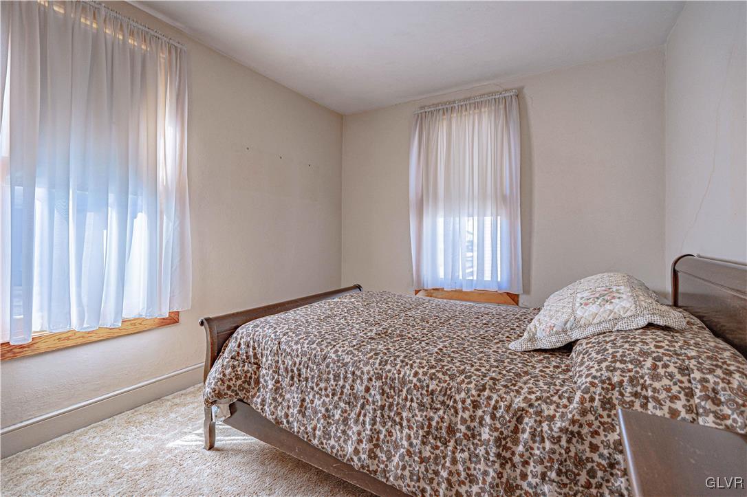 111 Maple Street Coplay, PA 18037 - Photo 21 of 38 a bedroom with a bed and a window