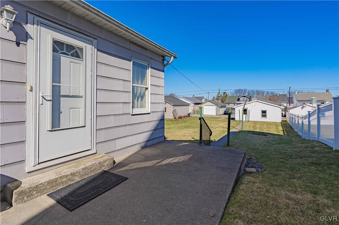 111 Maple Street Coplay, PA 18037 - Photo 31 of 38 a view of backyard with a table and chairs