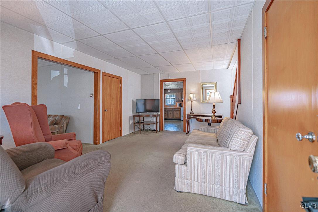111 Maple Street Coplay, PA 18037 - Photo 4 of 38 a living room with furniture and a wooden floor