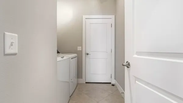 a view of a room with white door