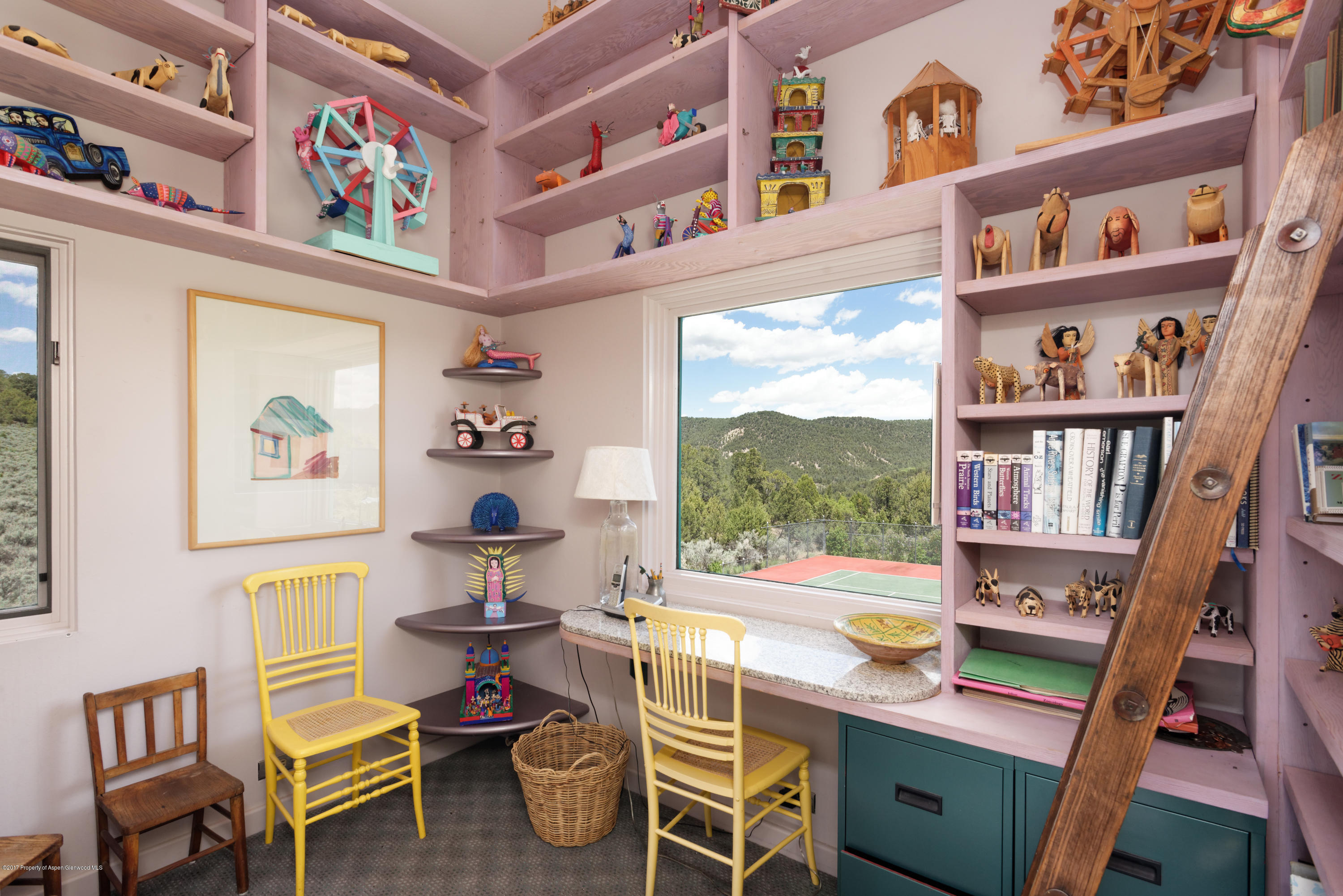 525 Cactus Flats Road Carbondale, CO 81623 - Photo 11 of 49 a view of a workspace with furniture and toys