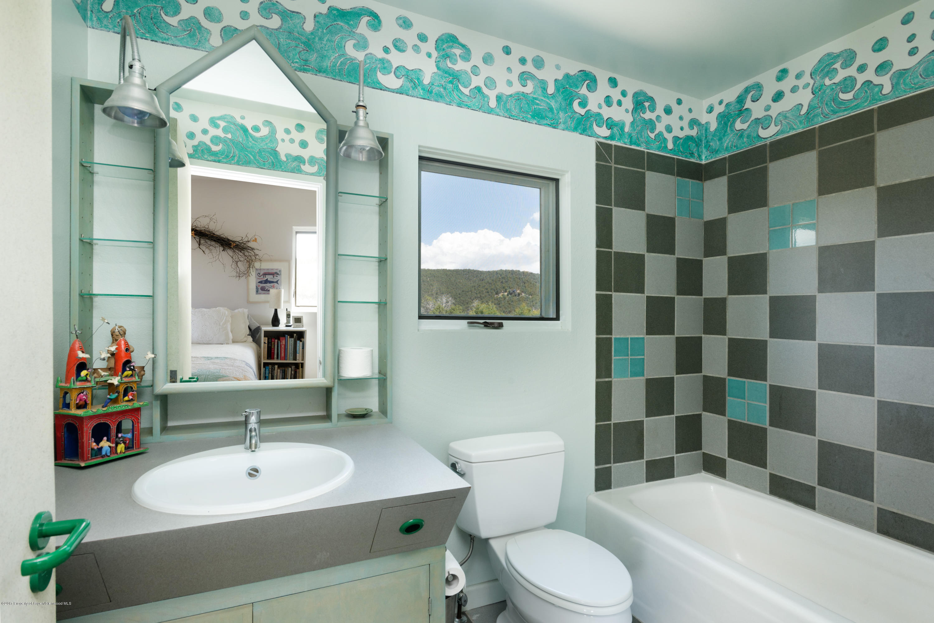 525 Cactus Flats Road Carbondale, CO 81623 - Photo 13 of 49 a bathroom with a sink a toilet and shower