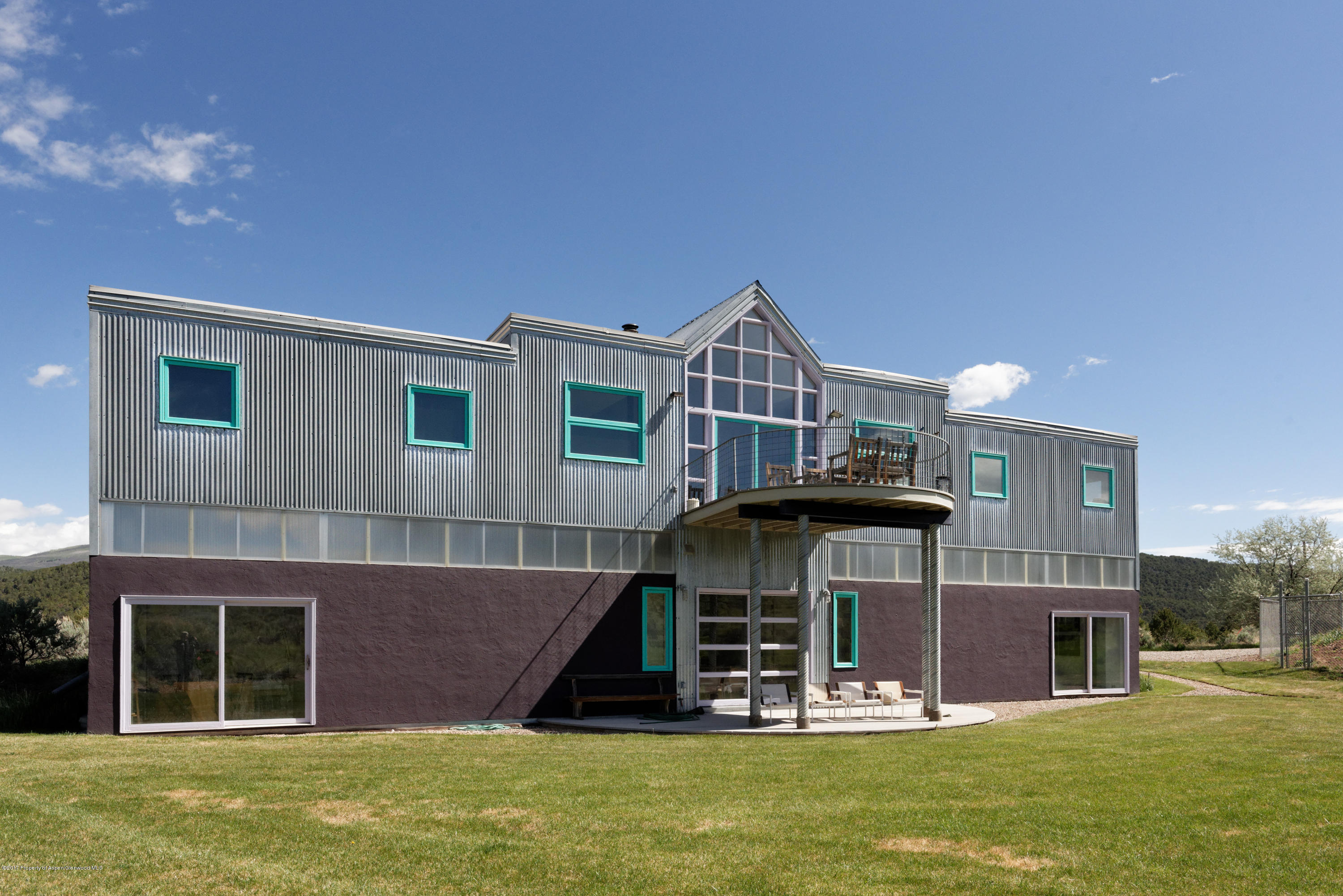 525 Cactus Flats Road Carbondale, CO 81623 - Photo 2 of 49 a view of a house with a yard