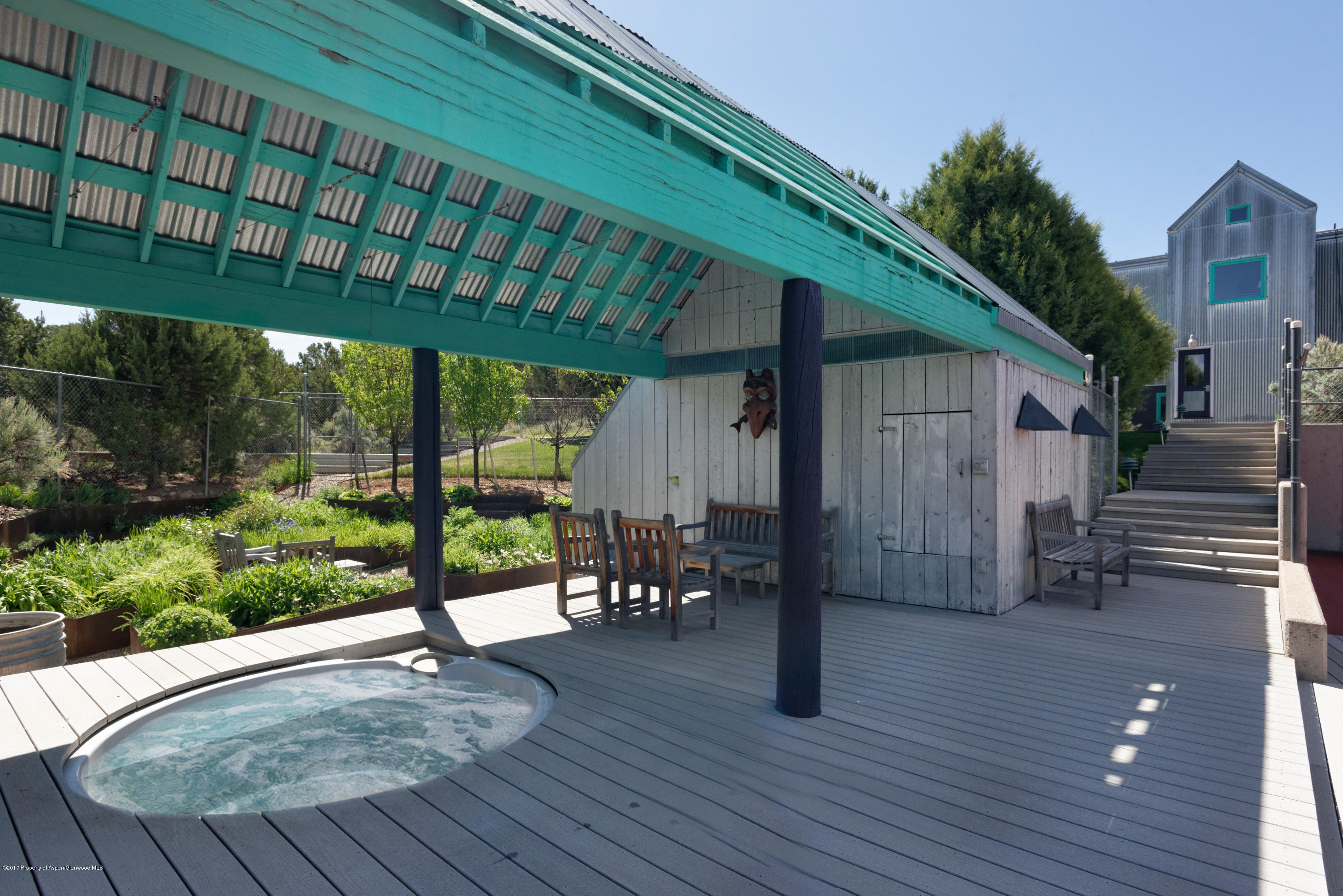 525 Cactus Flats Road Carbondale, CO 81623 - Photo 26 of 49 a view of a porch with wooden floor